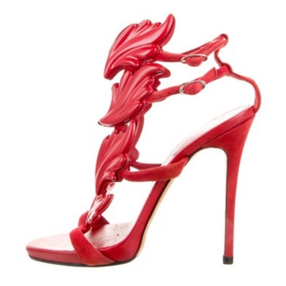 Giuzeppe Zanotti red heels. Worn in good condition.